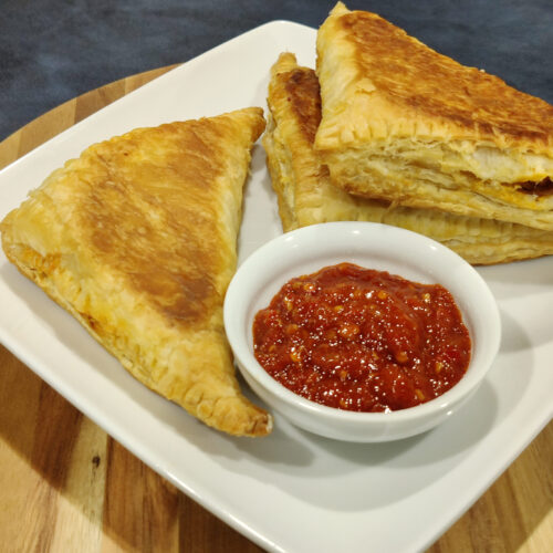 Indo-Chinese Puff Filled with Veg Noodles and Red Chutney